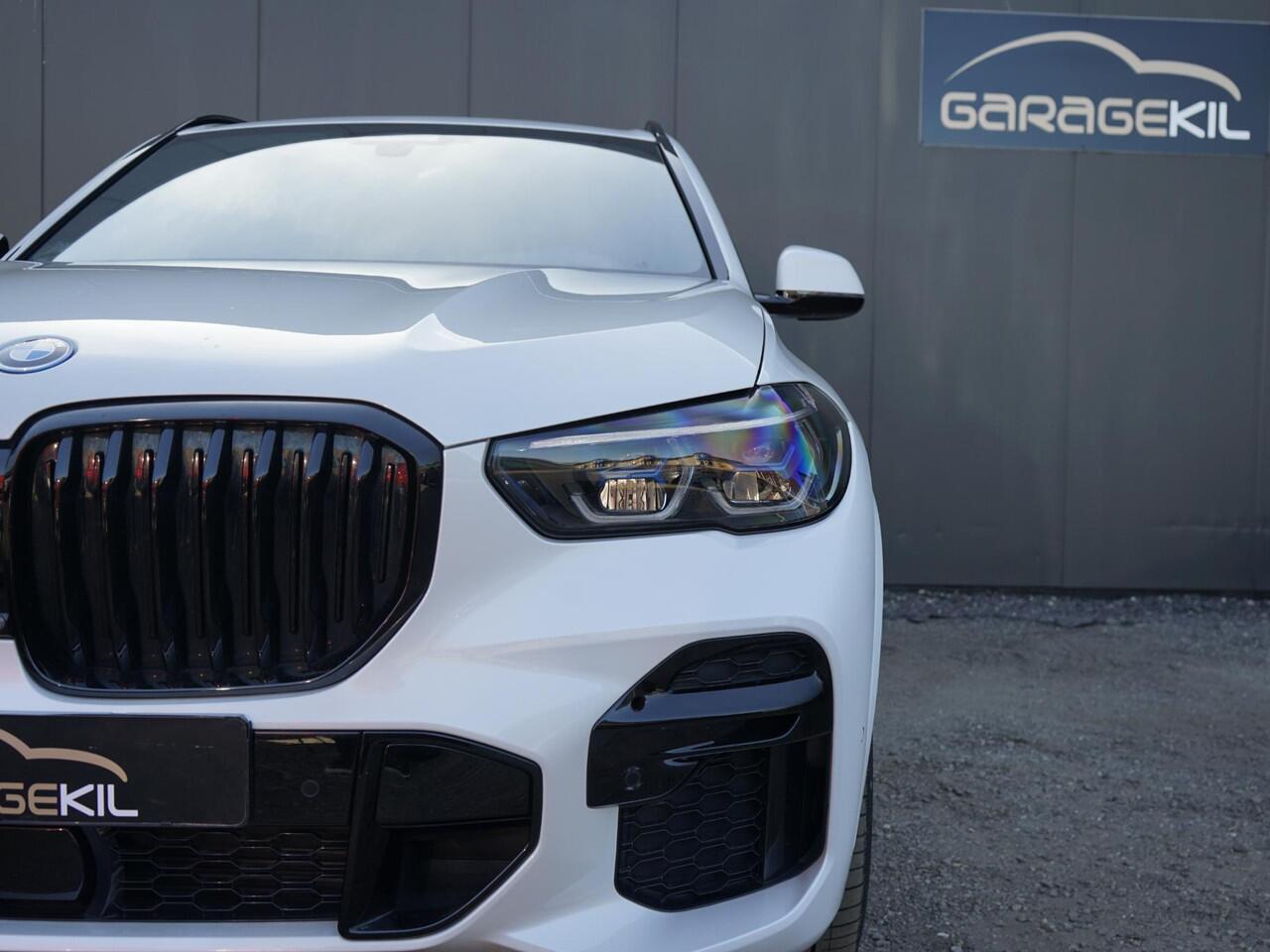 BMW X5 xDrive45e High Executive 1e Eig / Dealeronderh / Massage / Pano / achterasbesturing / Merino / Softclose / Ventilatie / 22inch / Laser / Parking prof / Driving prof