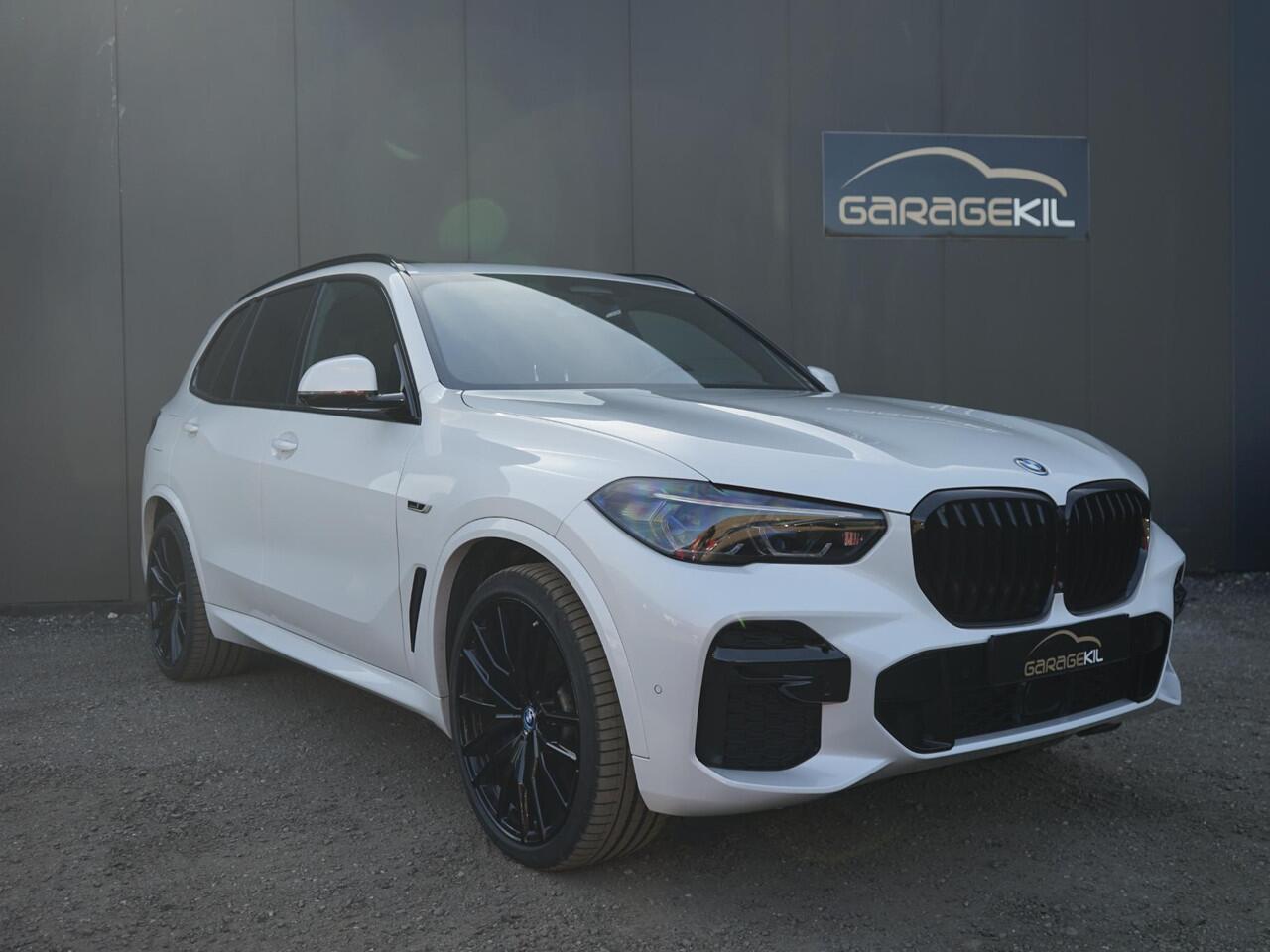 BMW X5 xDrive45e High Executive 1e Eig / Dealeronderh / Massage / Pano / achterasbesturing / Merino / Softclose / Ventilatie / 22inch / Laser / Parking prof / Driving prof