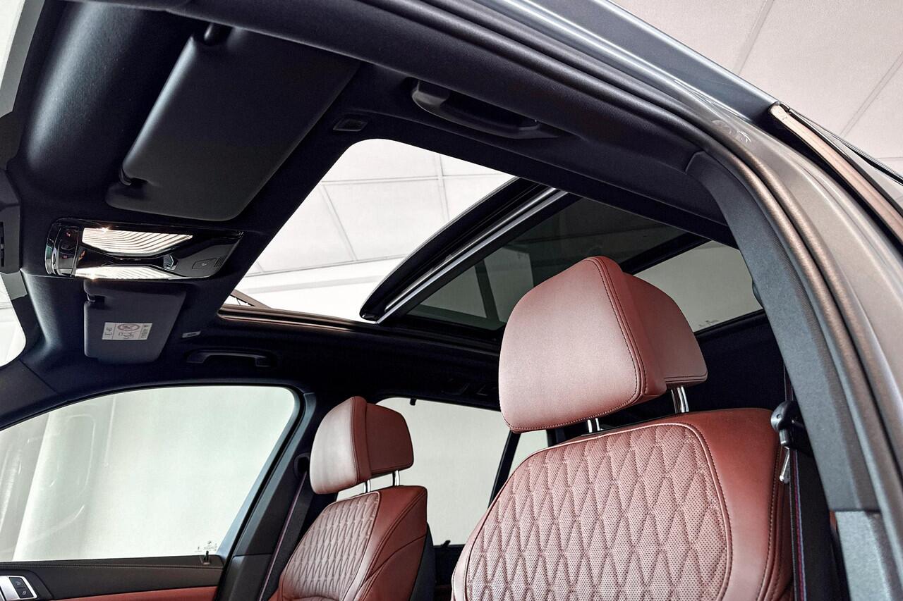 BMW X5 xDrive50e | M Sport | Driving Assistant Pro | Glazen Panoramadak | Massagestoelen | Harman Kardon