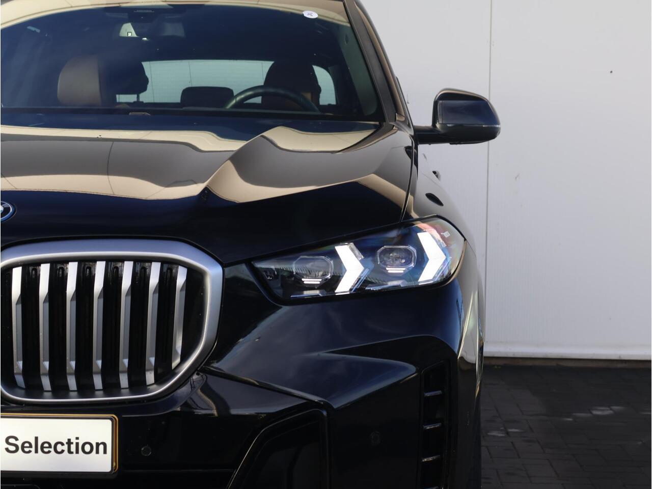 BMW X5 xDrive50e M Sportpakket/ 20 inch LM/ Comfort Access/ Elektrische Trekhaak/ Panoramadak/ Harman-Kardon