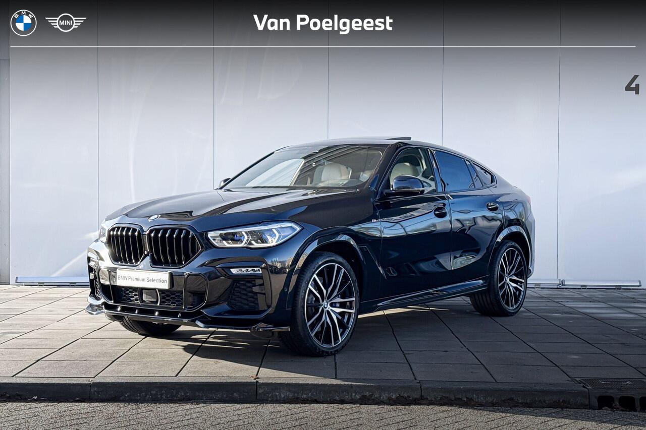 BMW X6 M50i High Executive M-Sport 22 Inch / Adaptief M-Onderstel / Soft Close / Glazen Schuifdak / Stoel ventilatie / Stoelverwarming Voor & Achter/ Warmte Comfort Pakket / Driving Assistant / Parking Assistant Plus / laser Ligt / Harman Kardon / Head Up Displa