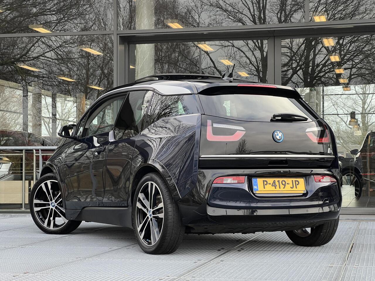 BMW i3 Business Edition Plus 120Ah 42 kWh 170PK | SOH 91.2% | Schuifkanteldak | Leder | Adaptieve Cruise Control | Stoelverwarming
