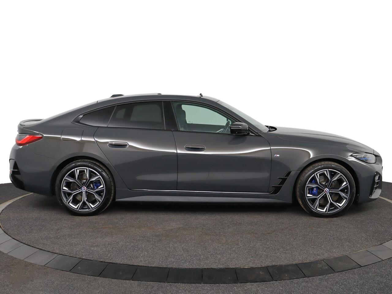 BMW i4 eDrive40 High Executive 84 kWh | M-Sportpakket | Schuifkanteldak