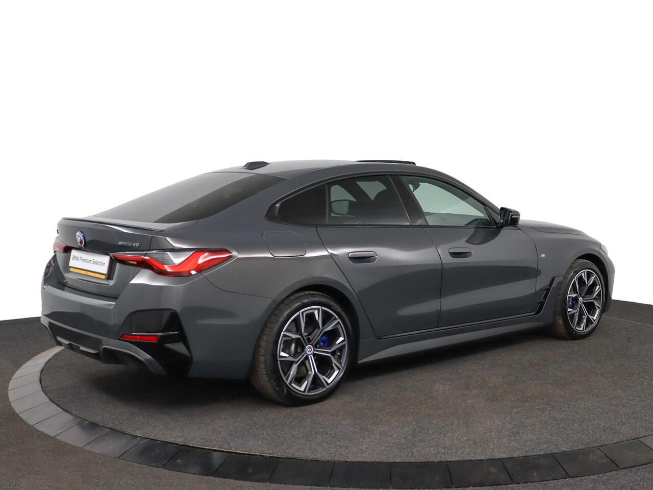 BMW i4 eDrive40 High Executive 84 kWh | M-Sportpakket | Schuifkanteldak