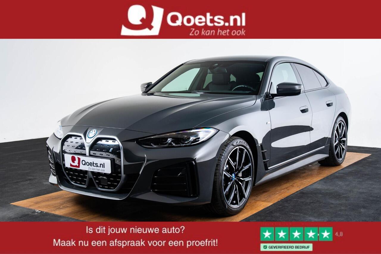 BMW i4 eDrive40 84 kWh M Sport - Trekhaak - Elektrisch verwarmde voorstoelen - Active Cruise Control - Getinte Ruiten - Comfort Access - Hifi - Ambiance verlichting - Live Cockpit Professional - IconicSounds Electric -