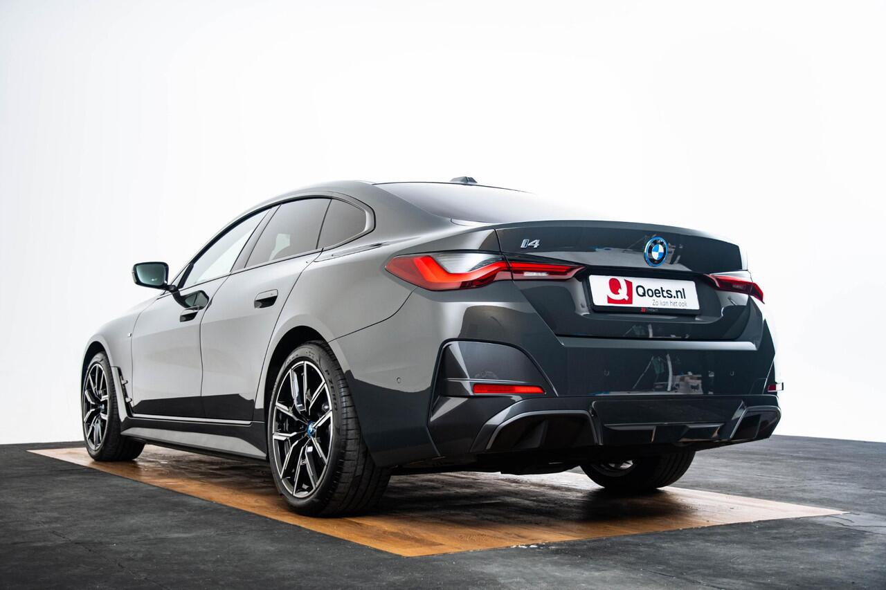 BMW i4 eDrive40 84 kWh M Sport - Trekhaak - Elektrisch verwarmde voorstoelen - Active Cruise Control - Getinte Ruiten - Comfort Access - Hifi - Ambiance verlichting - Live Cockpit Professional - IconicSounds Electric -