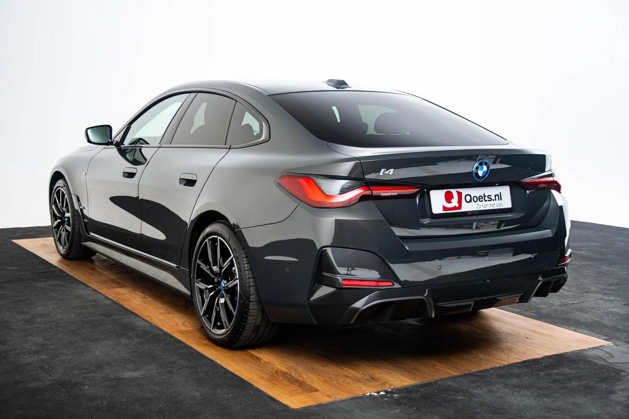 BMW i4 eDrive40 84 kWh M Sport - Trekhaak - Elektrisch verwarmde voorstoelen - Active Cruise Control - Getinte Ruiten - Comfort Access - Hifi - Ambiance verlichting - Live Cockpit Professional - IconicSounds Electric -