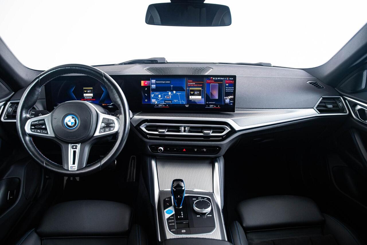 BMW i4 M50 High Executive 84 kWh Schuif/Kanteldak - Elektrisch verstelbare/verwarmde stoelen - Stuurwielrand verwarmd - Active Cruise Control - Hifi - Getinte Ruiten - M hoogglans Shadow Line -