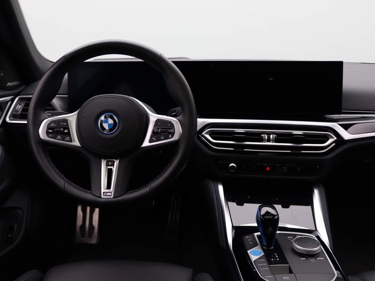 BMW i4 M50 | High Executive 84 kWh | M Sportpakket | Trekhaak | Driving Assistant Professional | Panoramadak
