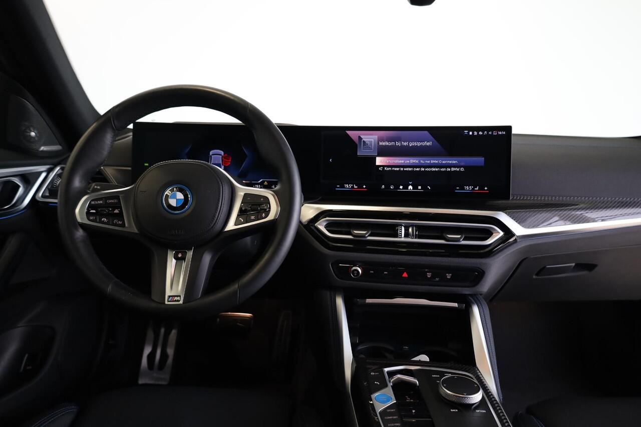 BMW i4 eDrive40 | M Sportpakket Pro | Head-Up Display | Harman/Kardon | Panorama Dak | Stoel- en Stuurverwarming