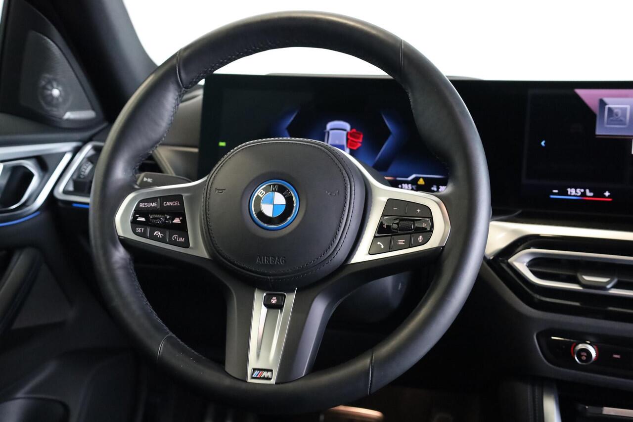 BMW i4 eDrive40 | M Sportpakket Pro | Head-Up Display | Harman/Kardon | Panorama Dak | Stoel- en Stuurverwarming