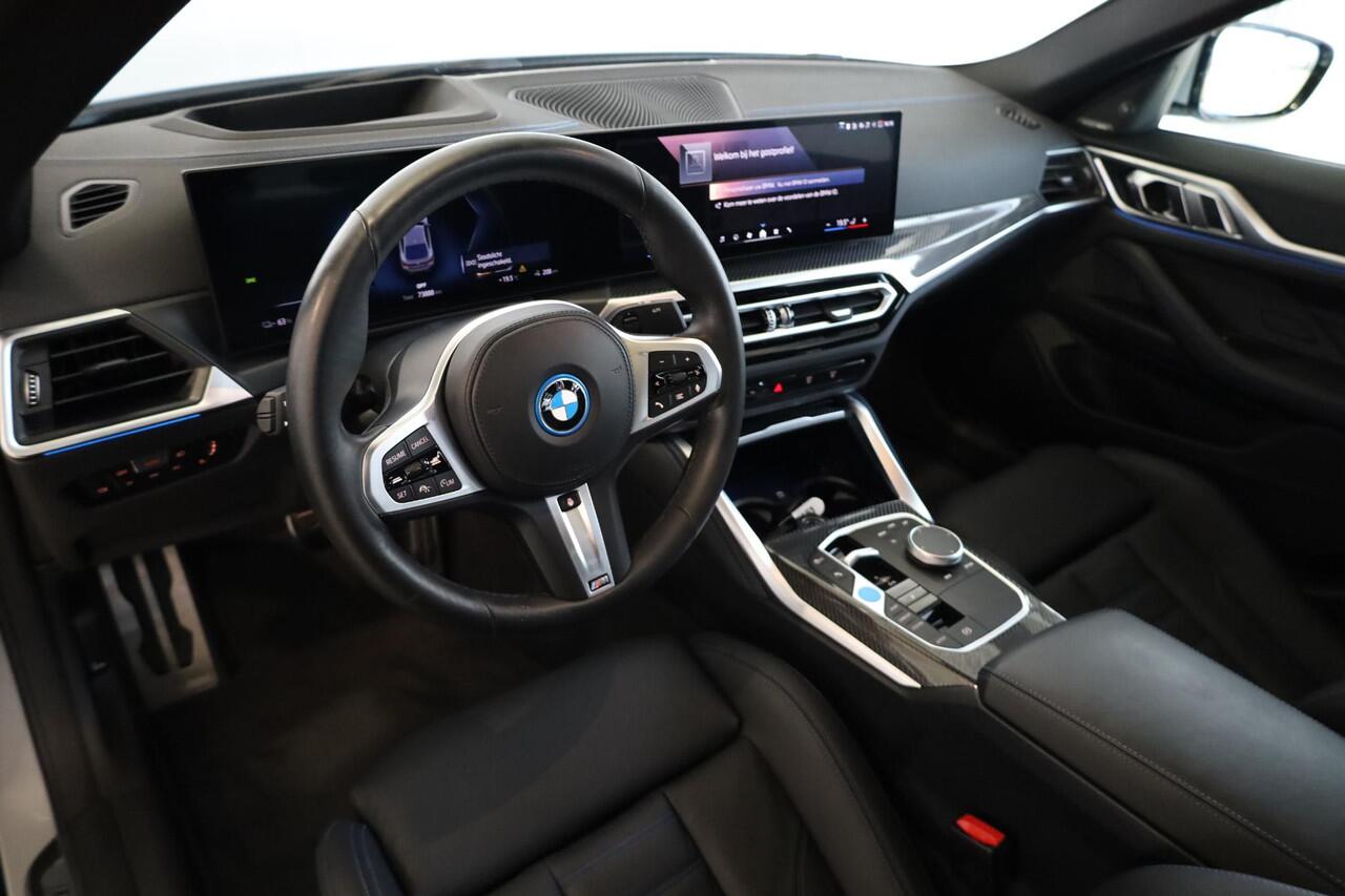 BMW i4 eDrive40 | M Sportpakket Pro | Head-Up Display | Harman/Kardon | Panorama Dak | Stoel- en Stuurverwarming