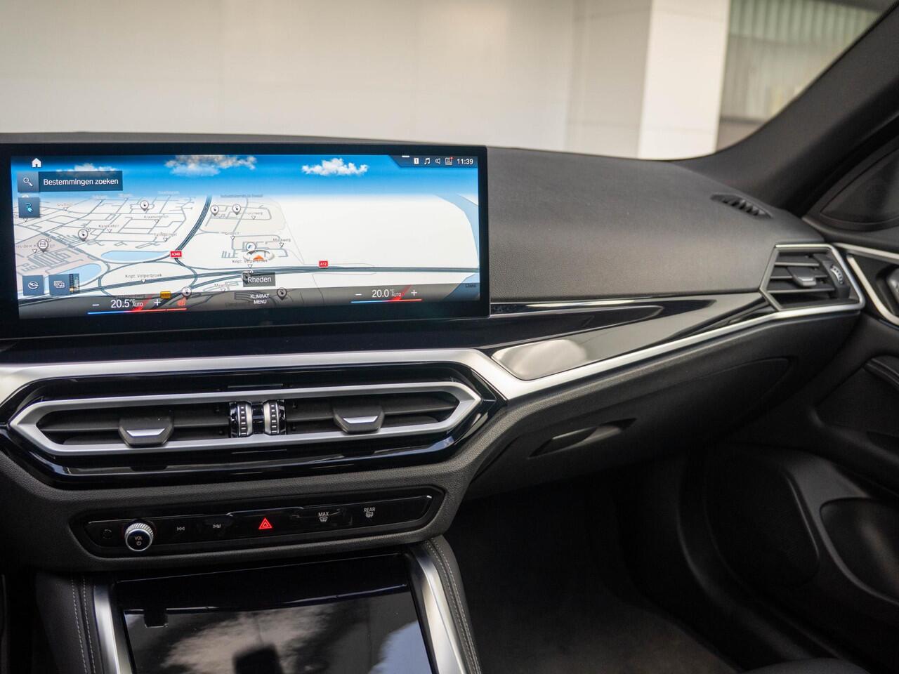 BMW i4 eDrive40 | M Sport | Stoelverwarming | Schuif-/kanteldak | Active Cruise Control | Parking Assistant Plus | 19''