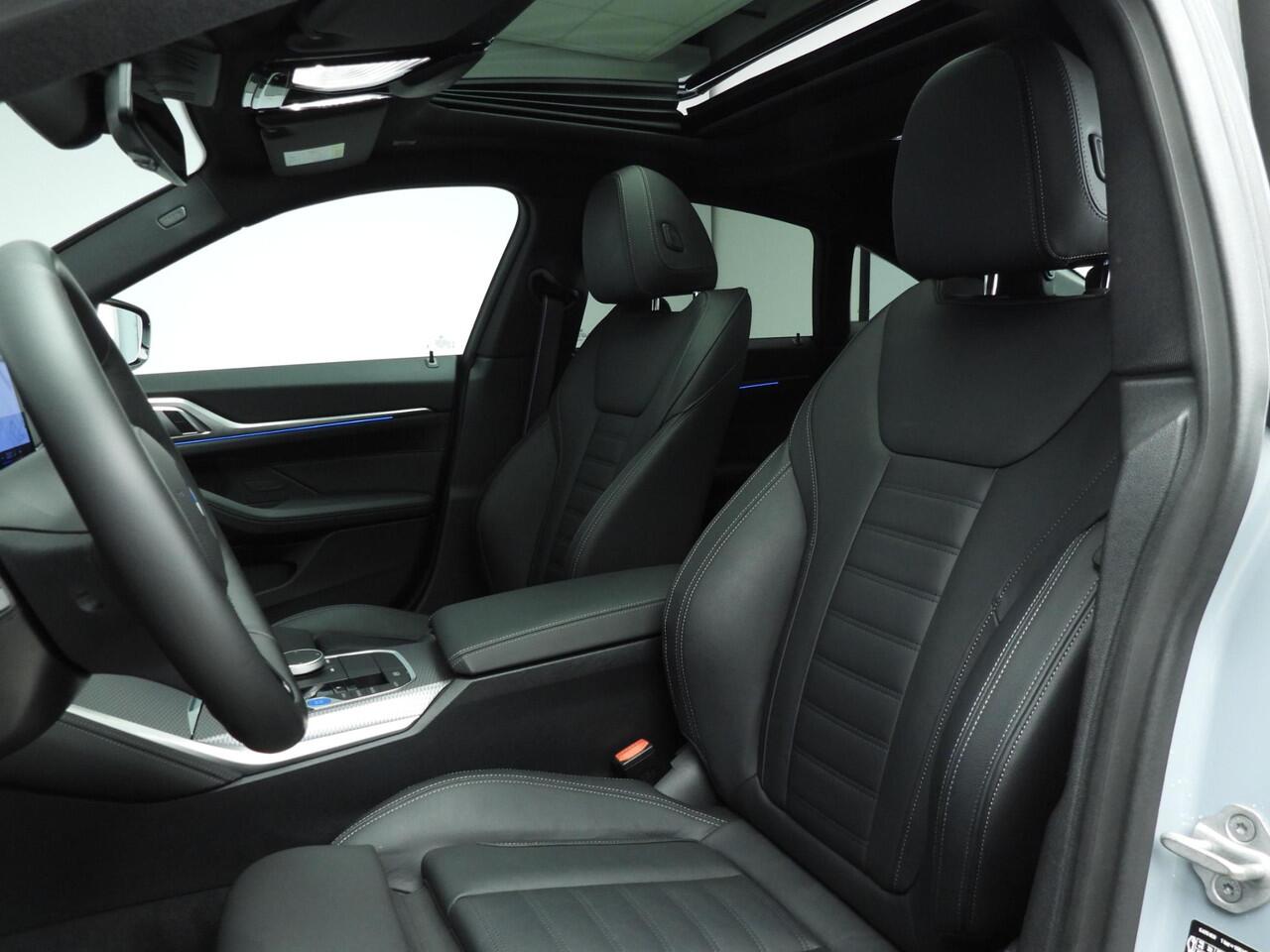 BMW i4 Gran Coupé eDrive35 M-Sportpakket | LED | Leder | HUD | Schuifdak | Active cruise | Sportstoelen | DAB | Hifi speakers | Alu 18 inch