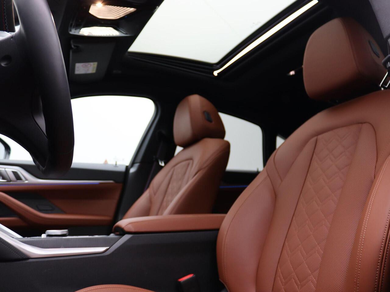 BMW i4 M50 High Executive | M Sportpakket Pro | Safety Pack | BMW Personal CoPilot Pack | Stuurwielrand Verwarmd | M Adaptief Onderstel | Schuifdak | Driving Assistant Professional | Harman Kardon | 20''