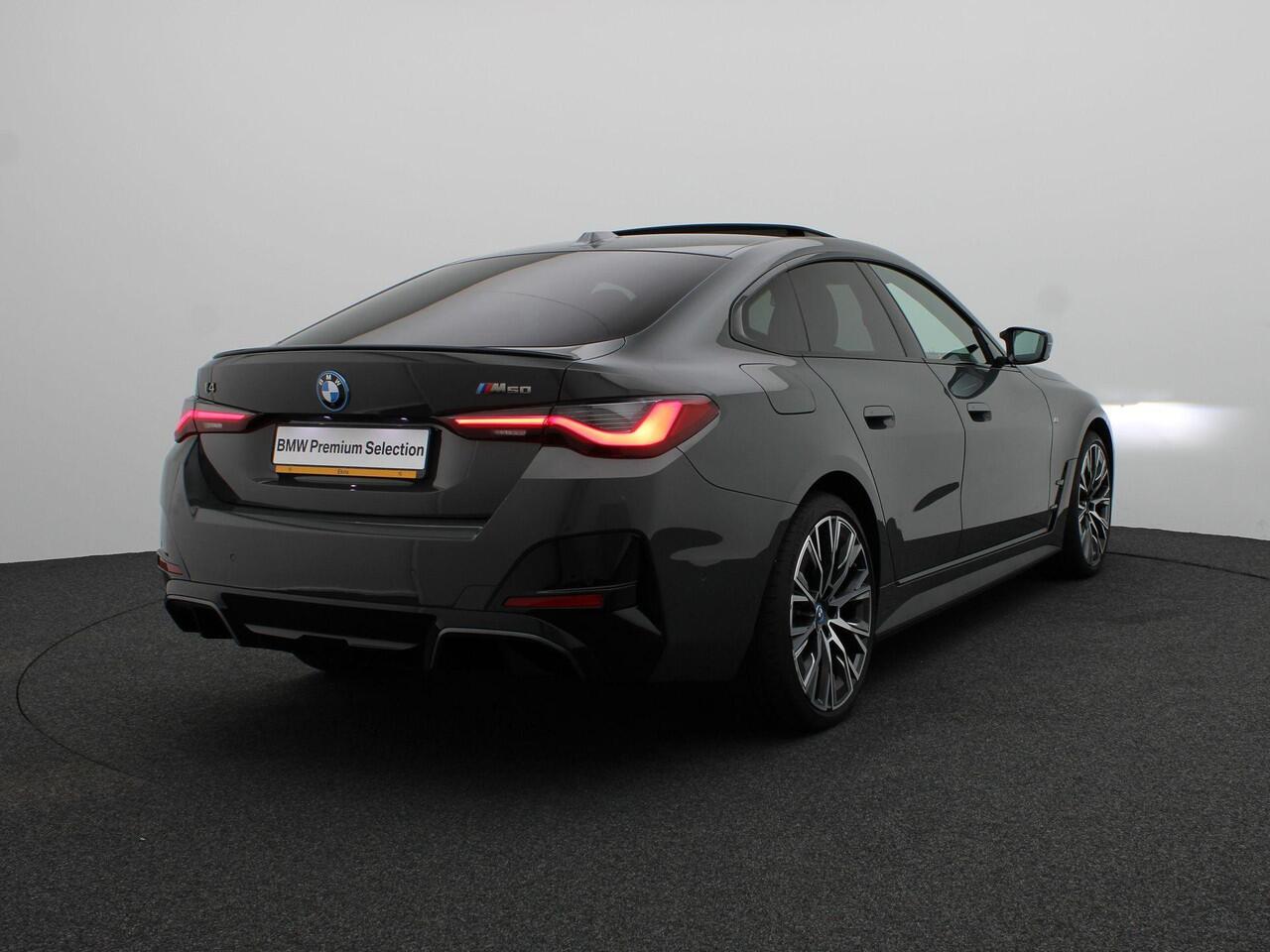 BMW i4 M50 High Executive | M Sportpakket Pro | Safety Pack | BMW Personal CoPilot Pack | Stuurwielrand Verwarmd | M Adaptief Onderstel | Schuifdak | Driving Assistant Professional | Harman Kardon | 20''