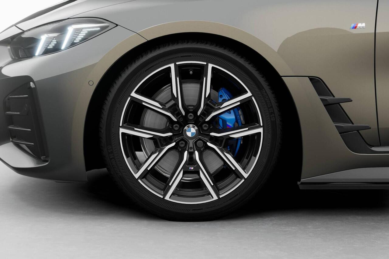 BMW i4 eDrive40 84 kWh | M Sportpakket | Extra getint glas in achterportierruiten en achterruit