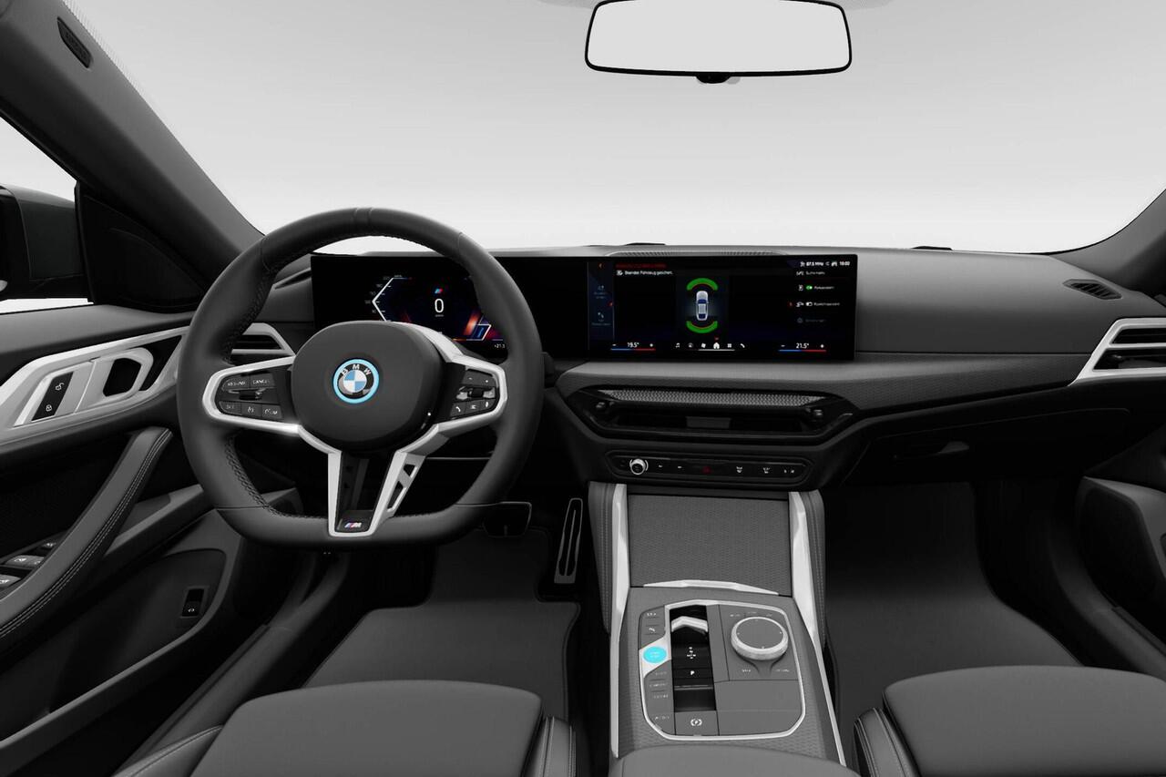 BMW i4 eDrive40 84 kWh | M Sportpakket | Extra getint glas in achterportierruiten en achterruit