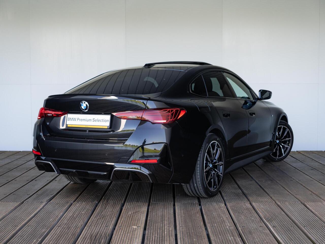 BMW i4 eDrive35 | M Sportpakket | Comfort Pack | Achteruitrijcamera | Comfort Access | Schuif-/kanteldak | Stoelverwarming | Parking Assistant | Ekris Selection