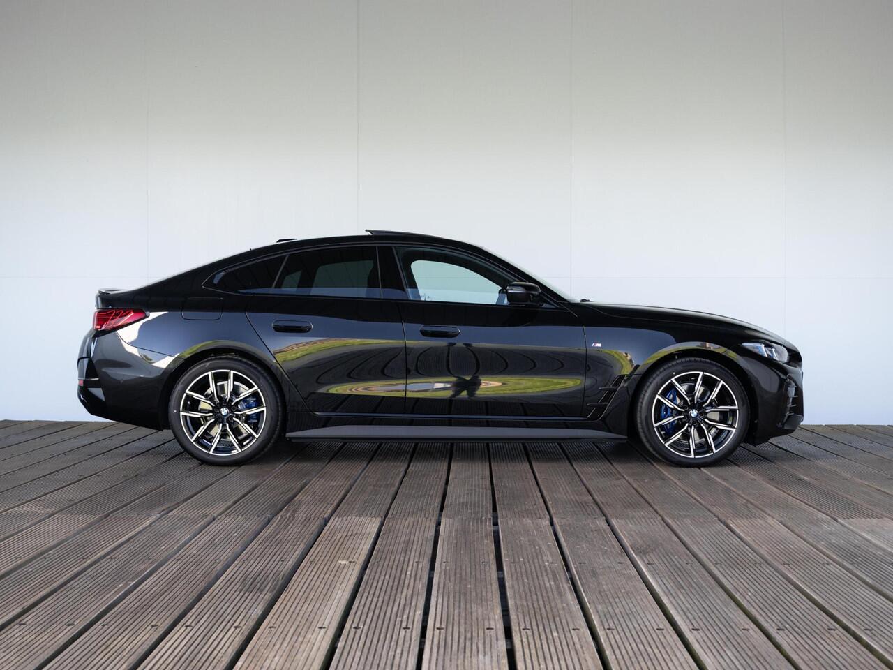 BMW i4 eDrive35 | M Sportpakket | Comfort Pack | Achteruitrijcamera | Comfort Access | Schuif-/kanteldak | Stoelverwarming | Parking Assistant | Ekris Selection