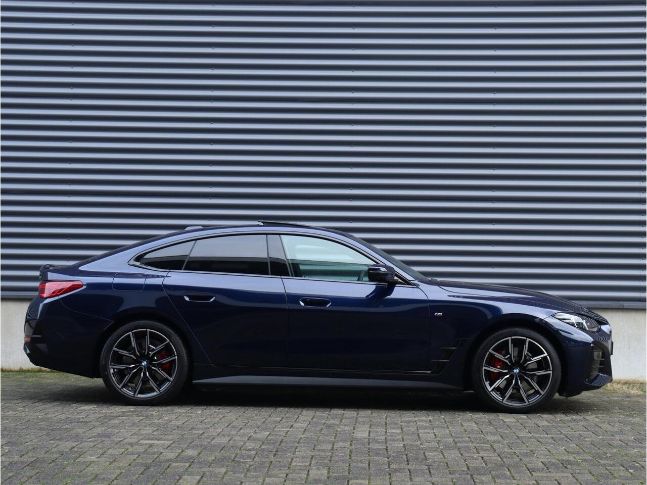 BMW i4 eDrive40 | High Executive | M Sportpakket Pro | Panodak | Driving Assistant Prof. | Head-Up | Laserlight | Harman Kardon | Parking Assistant Plus | Comfort Access | 19'' LMV