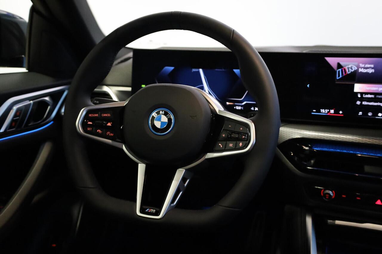 BMW i4 eDrive40 | M Sportpakket Pro | Schuif-kantel dak | Keyless | Active Cruise Control