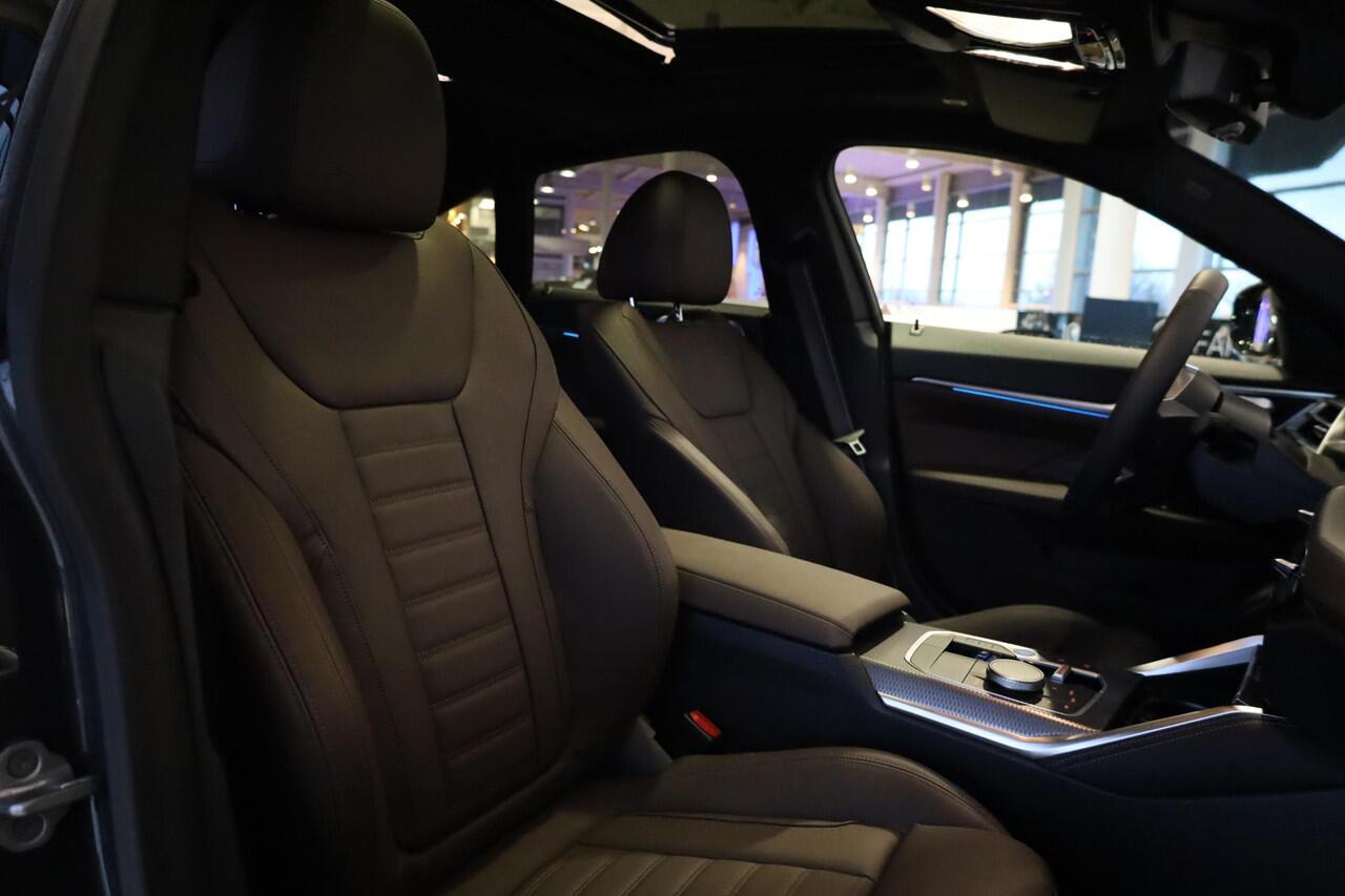 BMW i4 eDrive40 | M Sportpakket Pro | Schuif-kantel dak | Keyless | Active Cruise Control