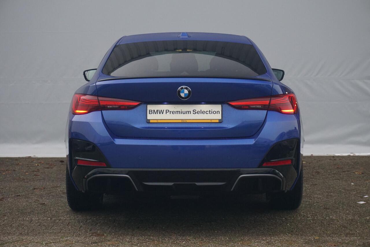 BMW i4 eDrive40 M Sportpakket Pro | Schuif-/kanteldak | Active Cruise Control | Verwarmde stoelen voor en achter | Comfort Access | Ekris Selection