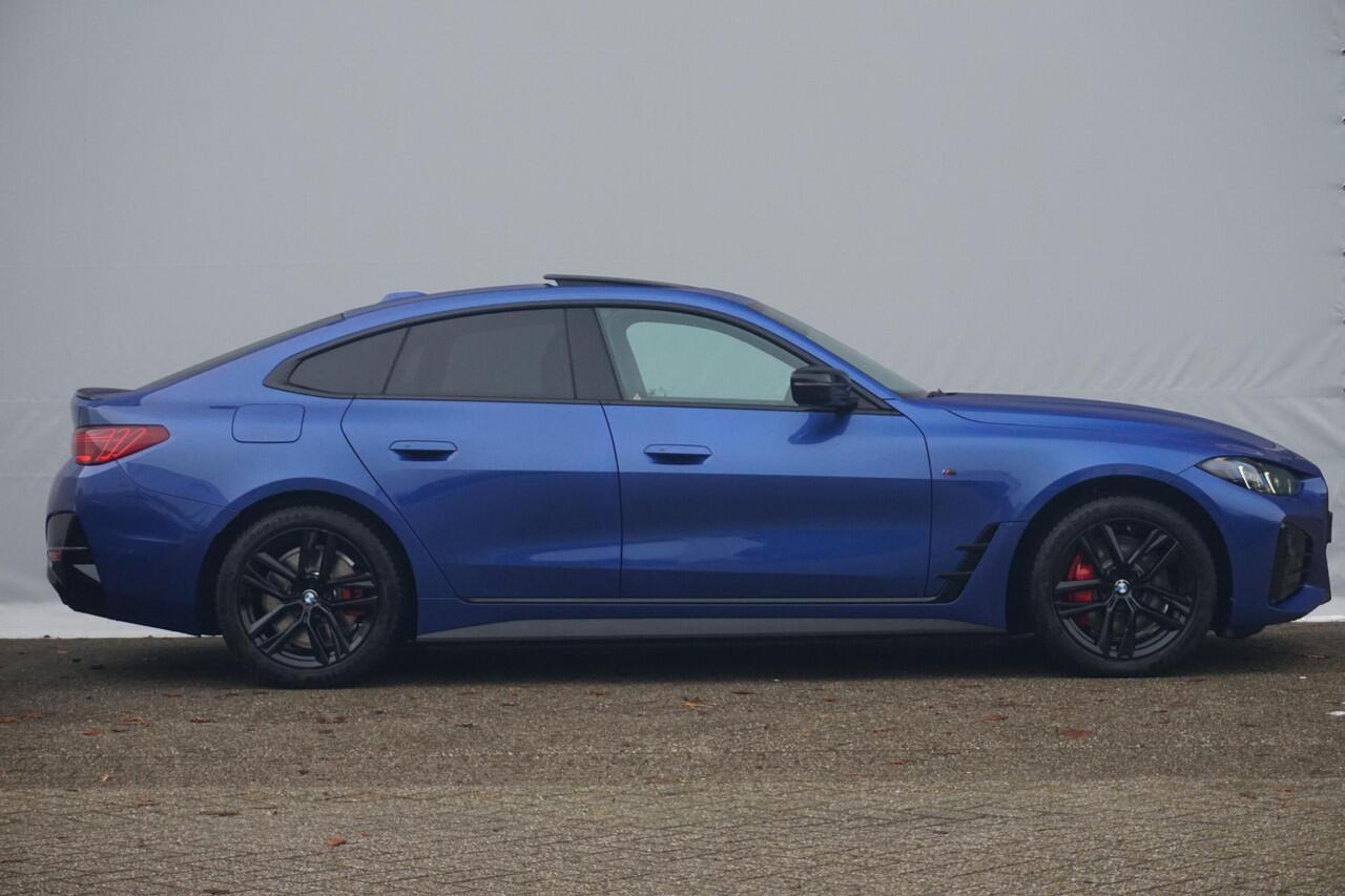 BMW i4 eDrive40 M Sportpakket Pro | Schuif-/kanteldak | Active Cruise Control | Verwarmde stoelen voor en achter | Comfort Access | Ekris Selection