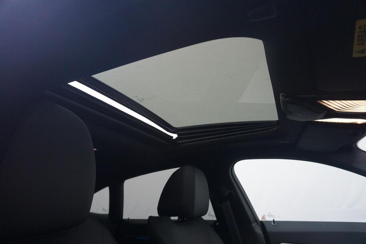 BMW i4 eDrive40 M Sportpakket Pro | Schuif-/kanteldak | Active Cruise Control | Verwarmde stoelen voor en achter | Comfort Access | Ekris Selection