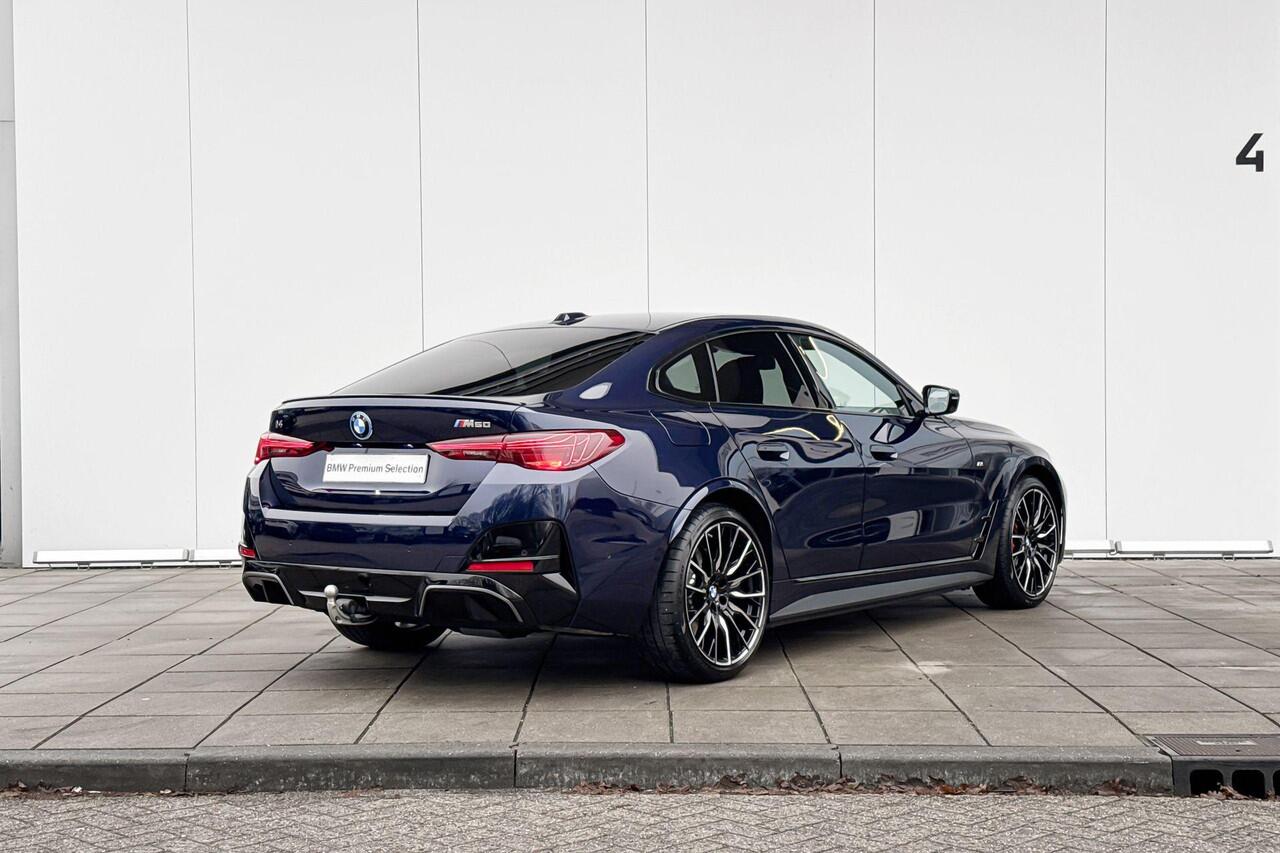 BMW i4 M50 M-Sport Pro Stuurwielrand Verwarming / Comfort Acces / Shadow Line Koplampen / 20 Inch / Dimmende Binnen & Buitenspiegel / Electrisch Verstelbare Voorstoelen / Adaptieve Led / Driving Prof / Parking Plus / Harman Kardon / Head Up Display / Electrische