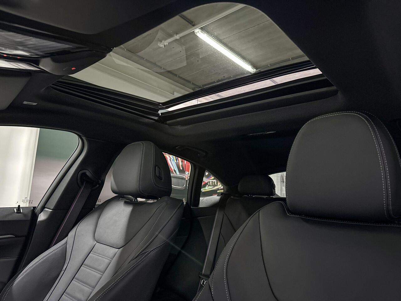 BMW i4 eDrive35 | M-Sport Pro | High Executive | Active Cruise Control | Schuif-/kanteldak