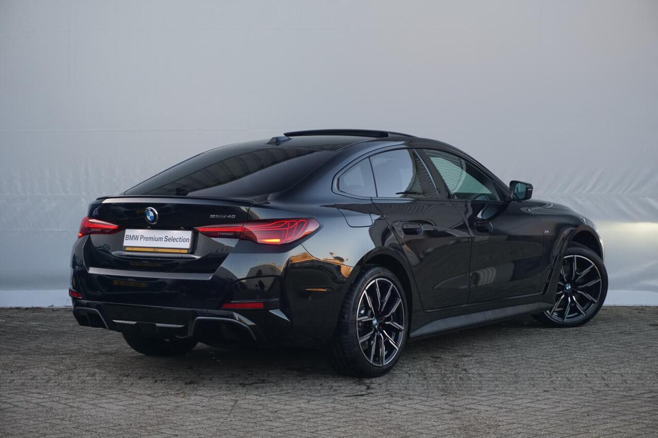 BMW i4 eDrive40 M Sportpakket Pro 19'' / Individual Interieur / Schuif-/kanteldak / Elektrisch verstelbare stoelen / Harman Kardon / Trekhaak / Ekris Selection