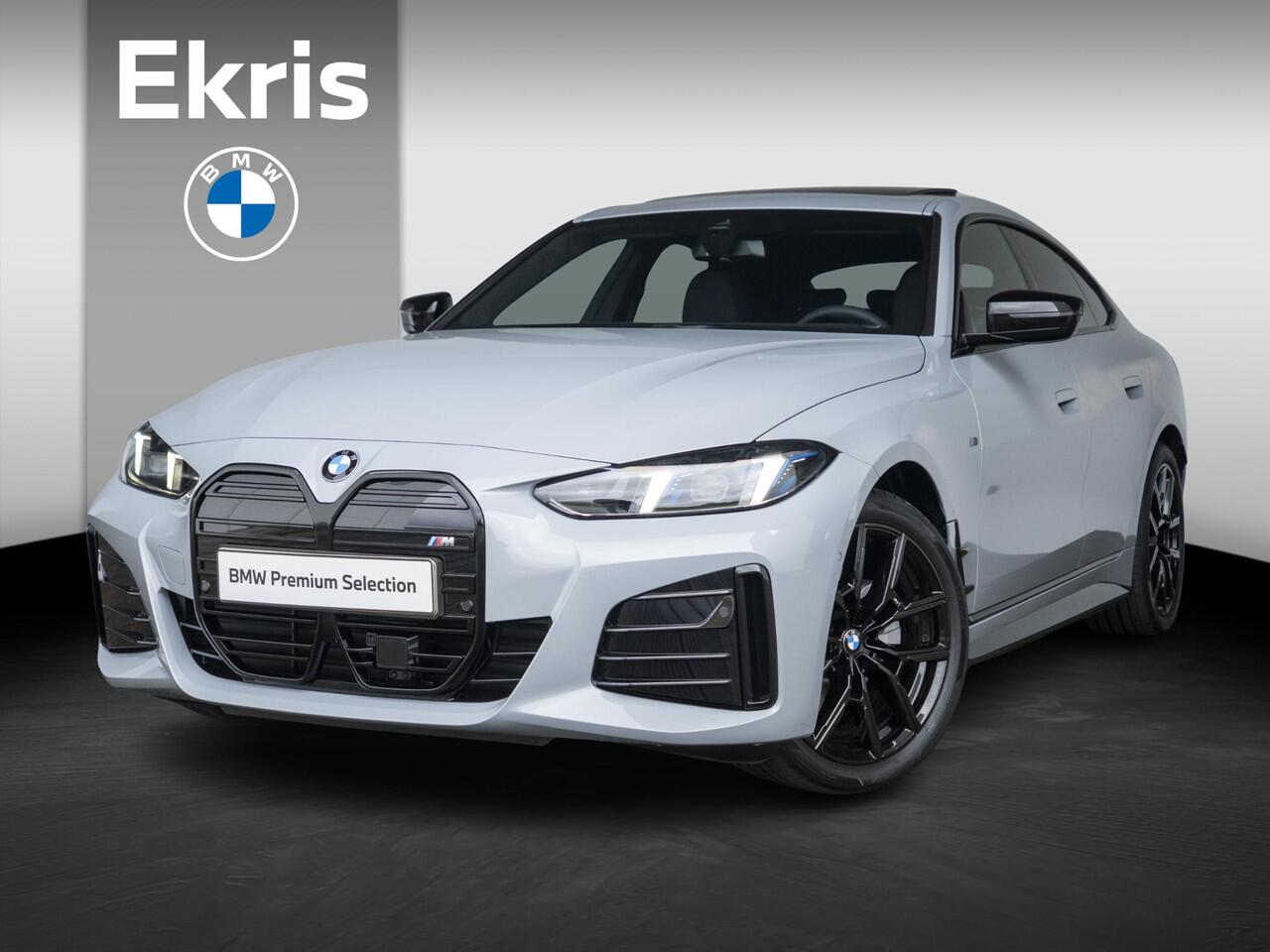 BMW i4 eDrive35 Gran Coupé | M Sportpakket | Comfort Pack | Stuurwielrand verwarmd | Comfort Access | Achteruitrijcamera | Schuif-/kanteldak | Stoelverwarming