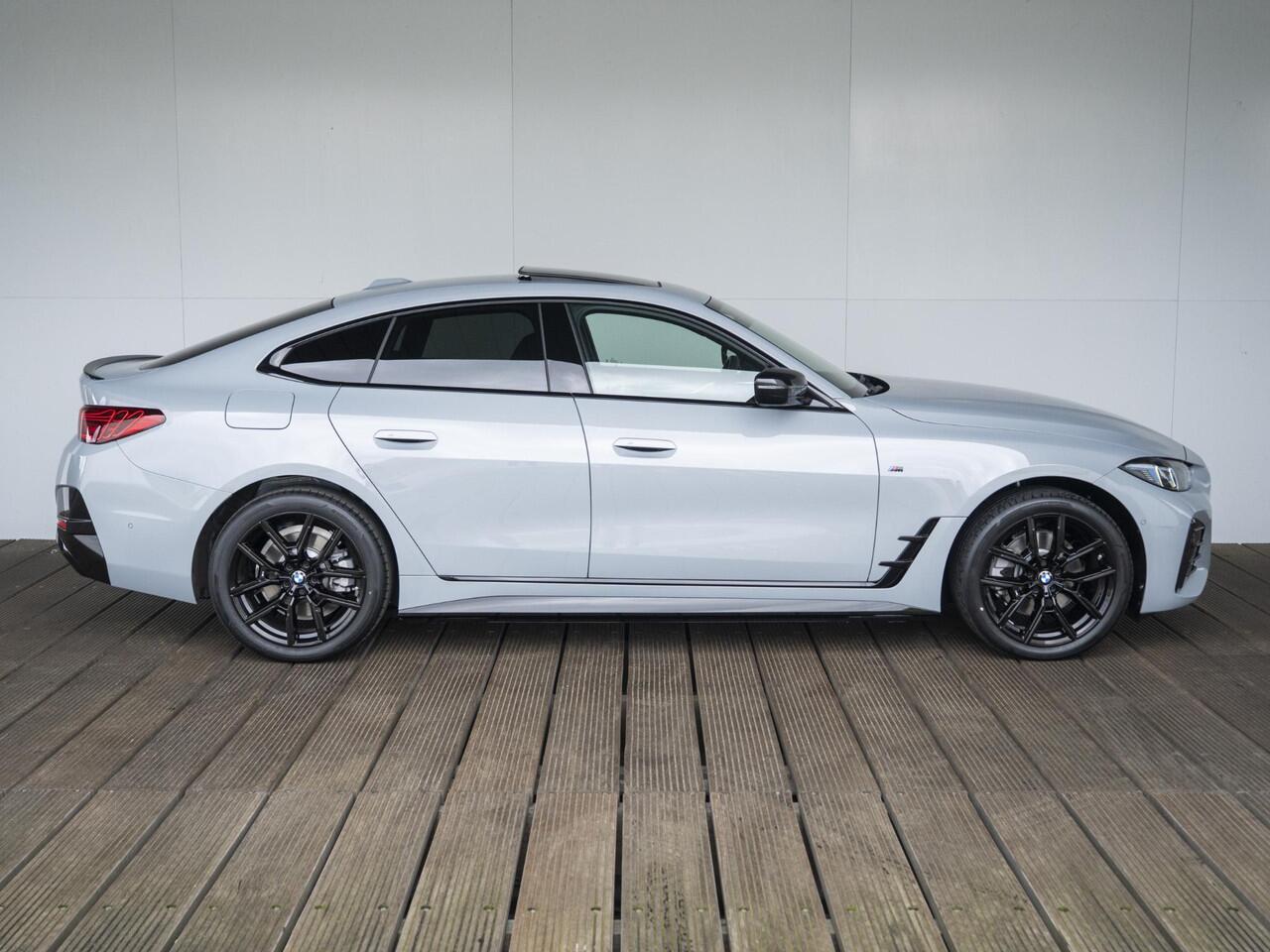 BMW i4 eDrive35 Gran Coupé | M Sportpakket | Comfort Pack | Stuurwielrand verwarmd | Comfort Access | Achteruitrijcamera | Schuif-/kanteldak | Stoelverwarming