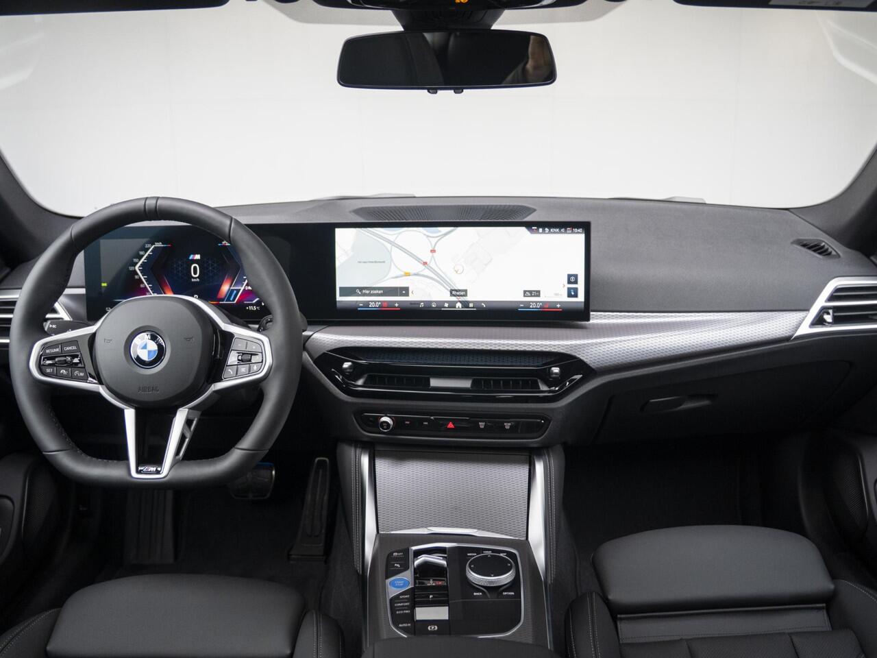 BMW i4 eDrive35 Gran Coupé | M Sportpakket | Comfort Pack | Stuurwielrand verwarmd | Comfort Access | Achteruitrijcamera | Schuif-/kanteldak | Stoelverwarming