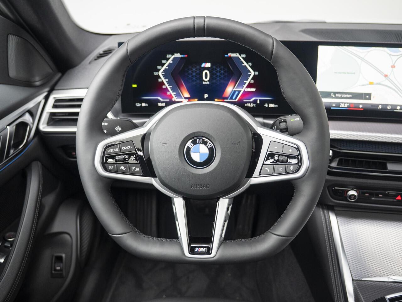 BMW i4 eDrive35 Gran Coupé | M Sportpakket | Comfort Pack | Stuurwielrand verwarmd | Comfort Access | Achteruitrijcamera | Schuif-/kanteldak | Stoelverwarming