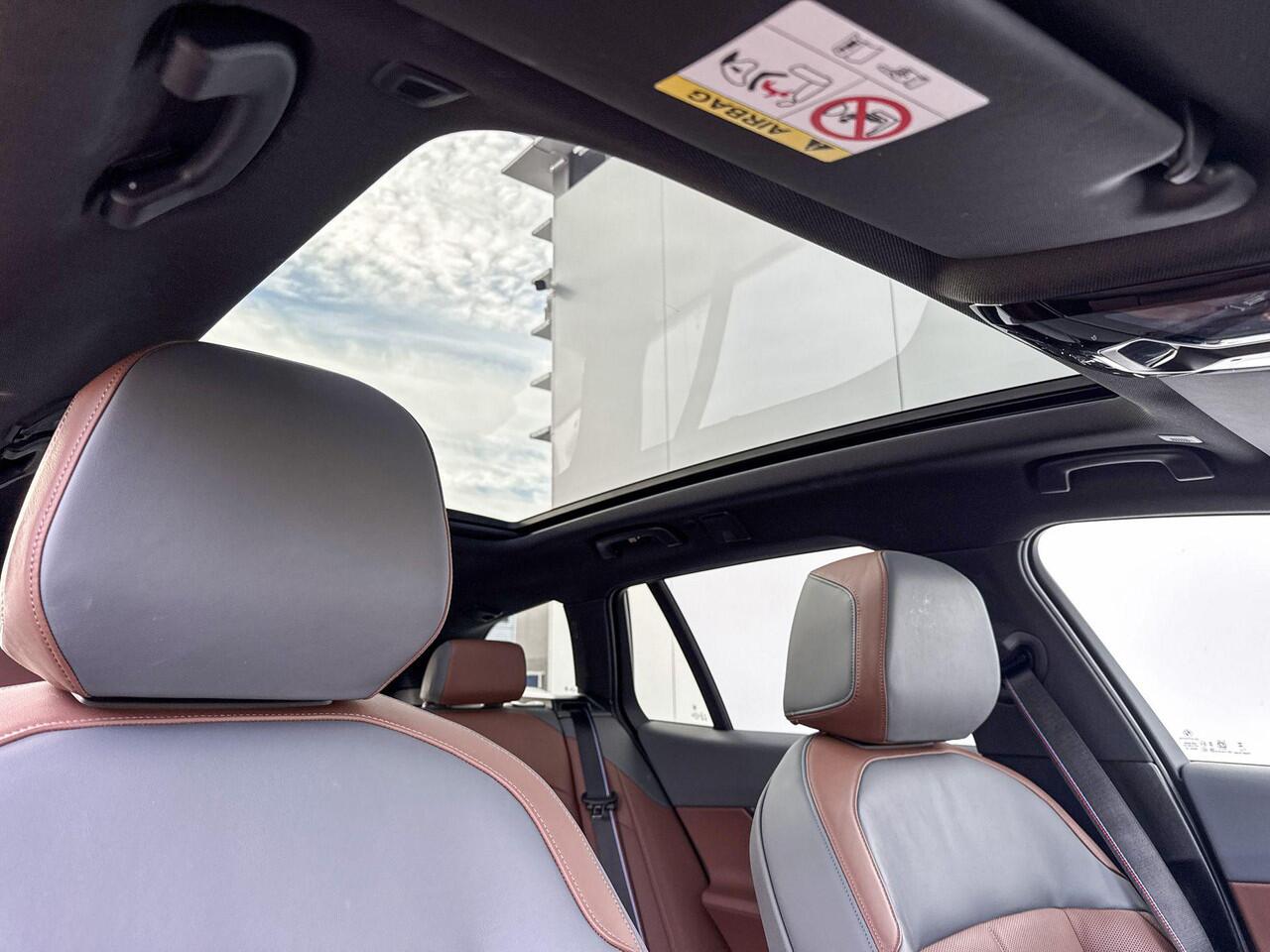 BMW i5 Touring M60 xDrive M-Sport Pro / Harman Kardon Audio / Trekhaak / Driving Prof / 21inch LM Velgen / Head Up Display / Glazendak / Stuurwielrandverwarming / Parking Prof