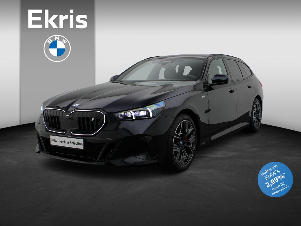 BMW i5 Touring eDrive40 M Sportpakket Pro | Panoramadak | Stoelverstelling elektrisch met memory | Bowers & Wilkins | 20"