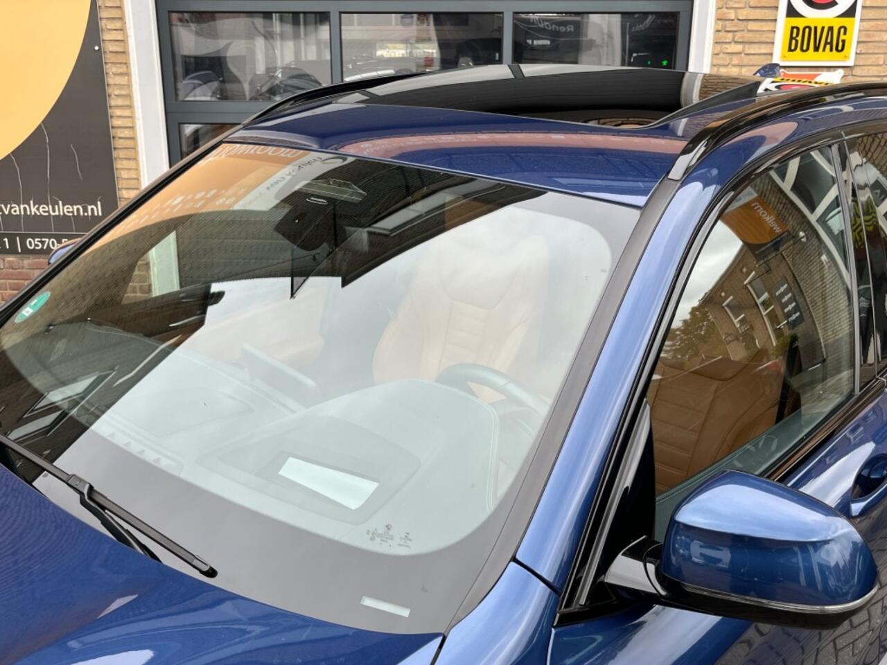 BMW iX HIGH EXECUTIVE 80KWh PANODAK/LEER/TREKHAAK/LED/CAMERA/1E EIG./NL