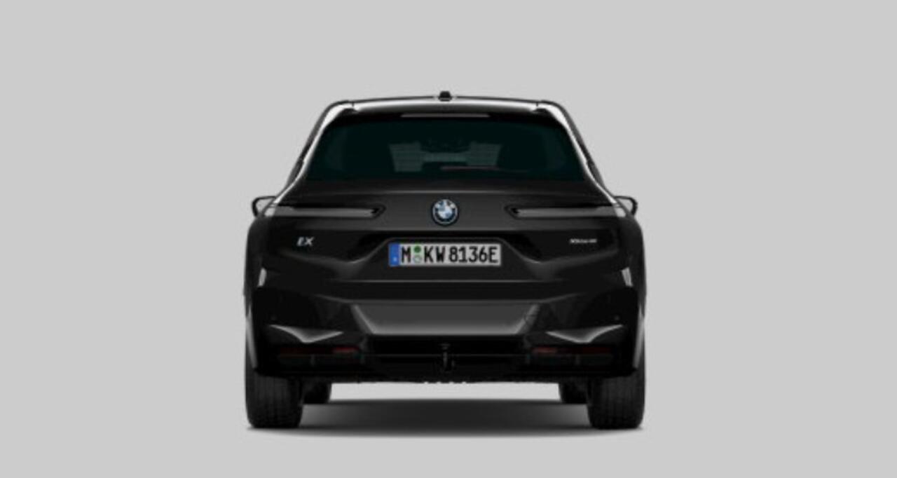 BMW iX xDrive40 77 kWh Sportpakket - Trekhaak - Multifunctionele stoelen - Comfort acces - Parking Assistant Plus - Harman Kardon - Extra-warmtewerende voorruit - Hemelbekleding in Anthrazit -