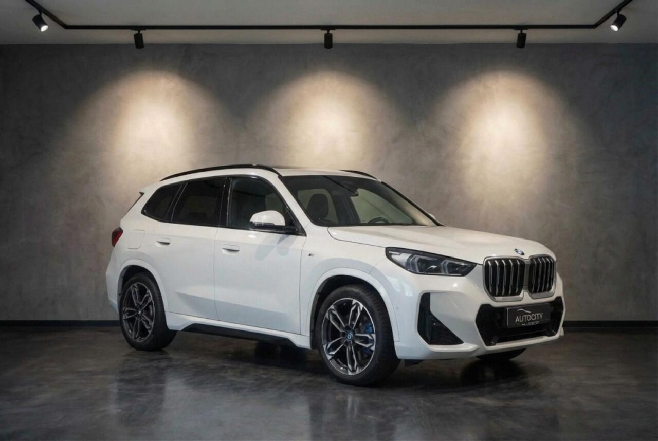 BMW iX1 30 xDrive 313 pk M Sport 100% SOH l Pano l Drive Assistant l Sha