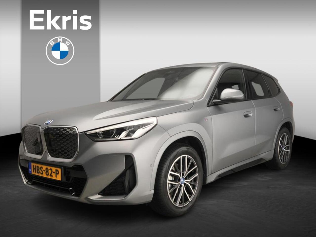 BMW iX1 eDrive20 | M-Sportpakket | LED | Navigatie | Schuifdak | Trekhaak | Elektr. zetels | DAB | Harman-kardon sound | Alu 18 inch