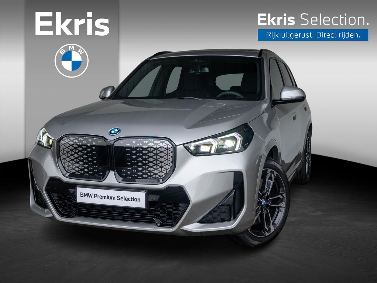 BMW iX1 eDrive20 | M Sportpakket Pro | Premium Pack | Stuurwielrand verwarmd | Comfort Access | Achteruitrijcamera | Panoramadak | Stoelverwarming | Trekhaak | Ekris Selection