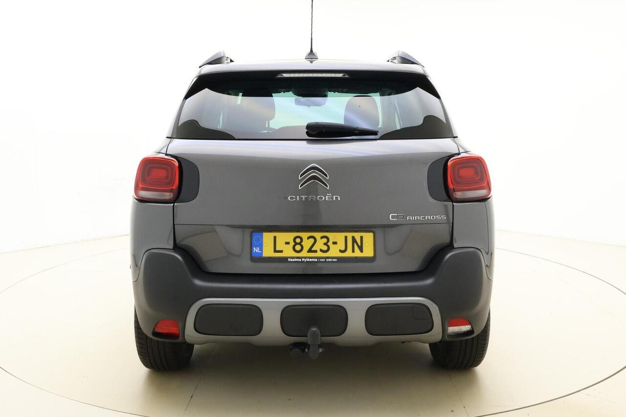 Citroen C3 Aircross 1.2 PureTech C-Series 110 PK | Navigatie | Climate control | Trekhaak | Parkeersensoren | Getint glas | Hoge instap | Dakrails | Cruise control