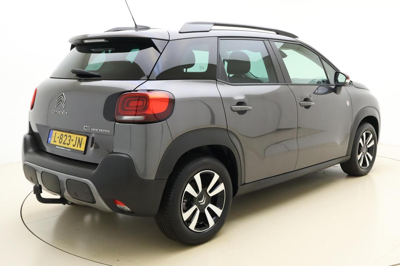 Citroen C3 Aircross 1.2 PureTech C-Series 110 PK | Navigatie | Climate control | Trekhaak | Parkeersensoren | Getint glas | Hoge instap | Dakrails | Cruise control