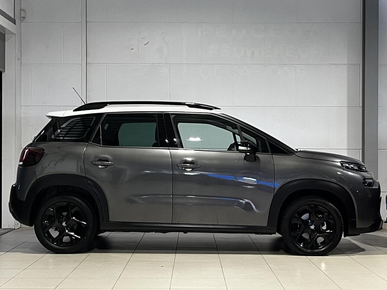 Citroen C3 Aircross Shine Pack 1.2 Turbo 110pk | LEDER | STOELVERW. | KEYLESS ENTRY | HEAD-UP DISPLAY | 17" LM-VELGEN | NAVI | CAMERA | ALL-SEASONBANDEN
