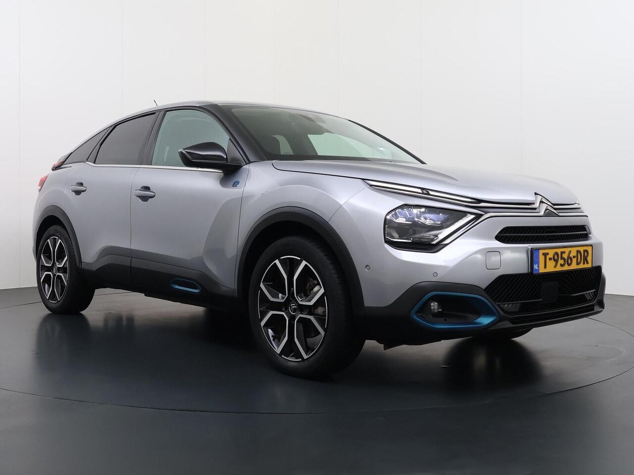 Citroen ë-C4 Shine 50 kWh SOH 98% 3-FASE LADER | STUUR- & STOELVERWARMING | TREKHAAK | HEAD-UP DISPLAY | CAMERA | KEYLESS START & GO | DODEHOEKDETECTIE | RIJKLAAR MET 12 MAANDEN BOVAG-GARANTIE
