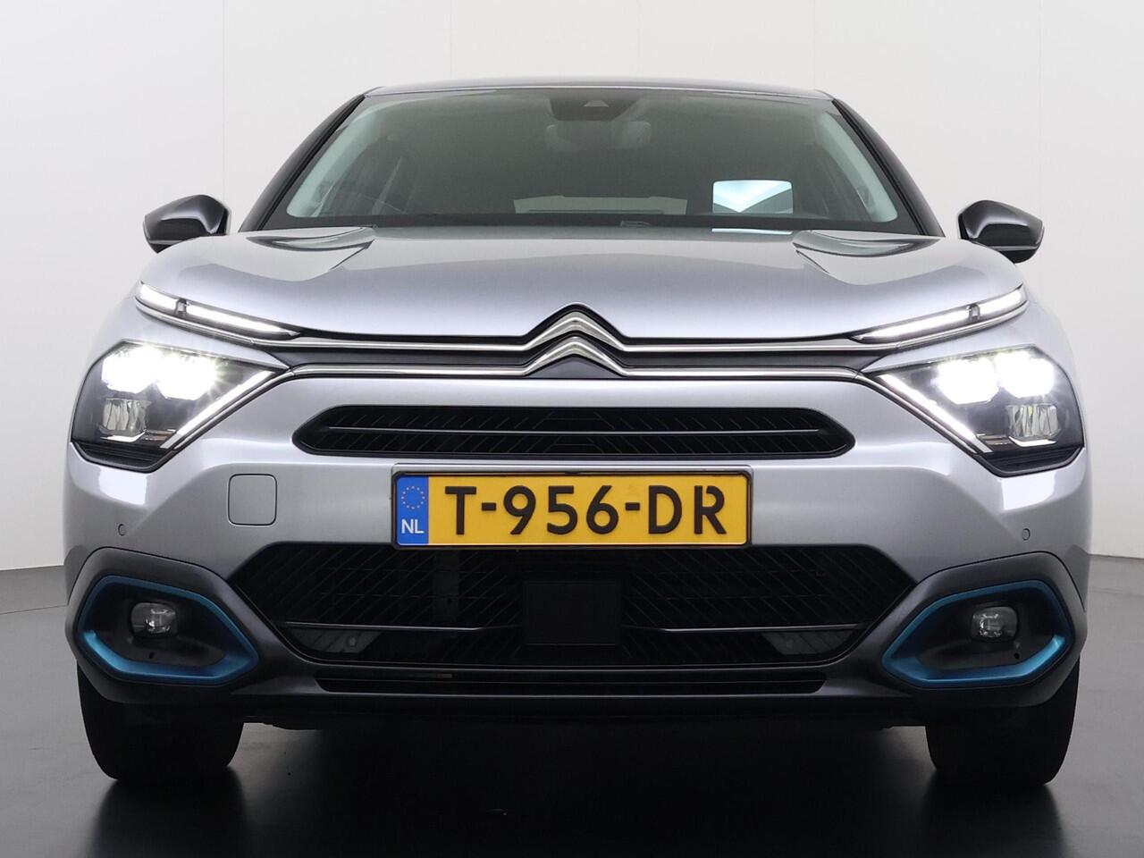 Citroen ë-C4 Shine 50 kWh SOH 98% 3-FASE LADER | STUUR- & STOELVERWARMING | TREKHAAK | HEAD-UP DISPLAY | CAMERA | KEYLESS START & GO | DODEHOEKDETECTIE | RIJKLAAR MET 12 MAANDEN BOVAG-GARANTIE