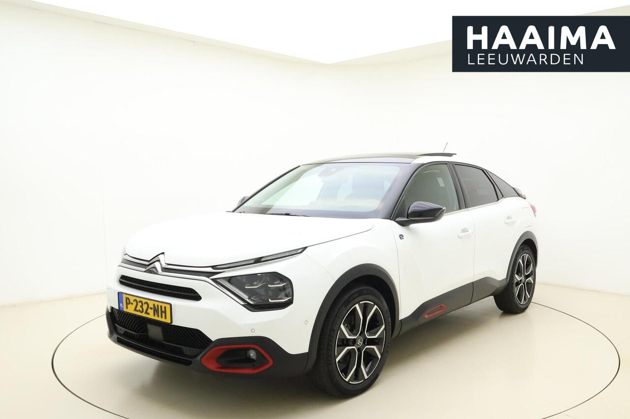 Citroen ë-C4 Shine 50 kWh SOH 91,44% | Panoramisch schuif/kanteldak | Navigatie | Lederen bekleding | Stoelverwarming | Camera | Keyless | Climate control | Verwarmd voorruit